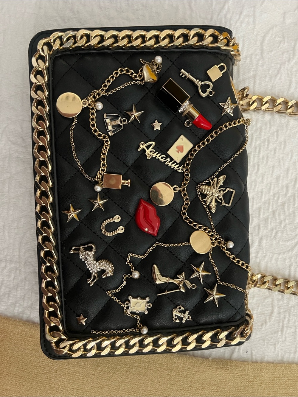 Aldo Black Quilted Crossbody with Gold Chain & Charms